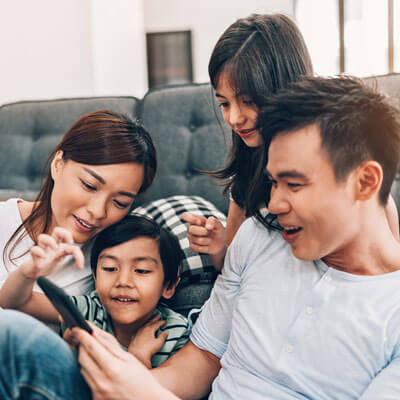 Family looking at phone